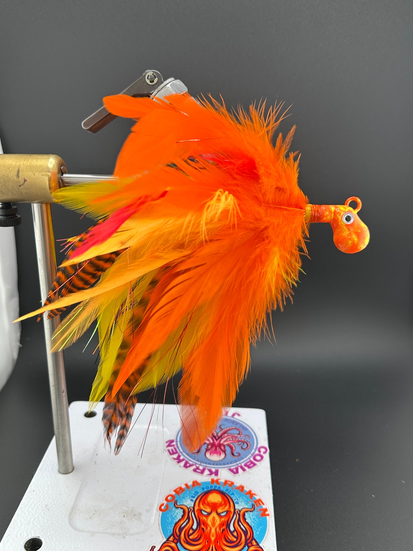 Orange yellow and red cobia jig by Cobia Kraken Jigs