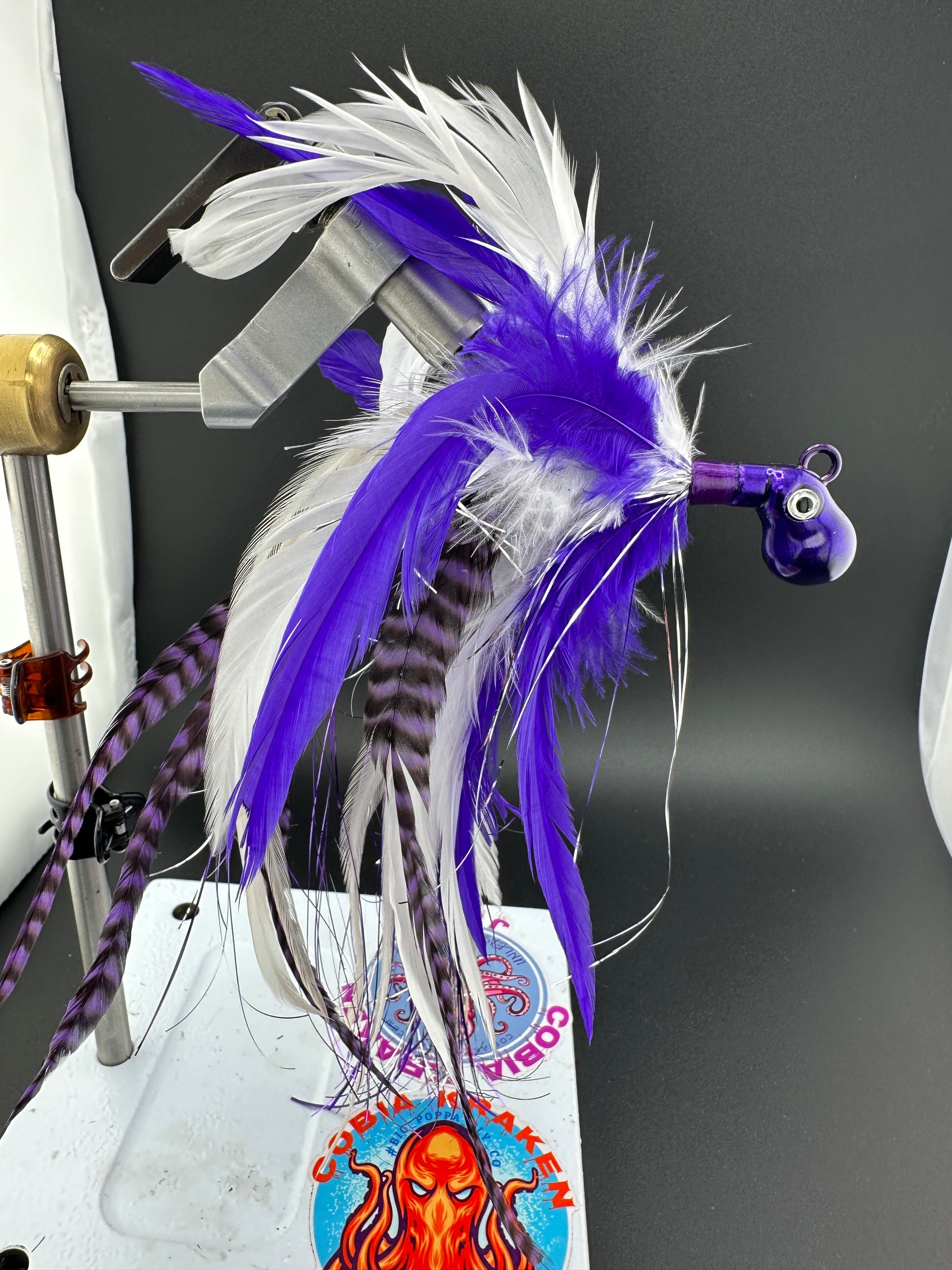 Purple and white custom saltwater feather jigs 