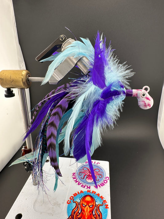 Purple and blue cobia jig with grizzly tail and 2oz octopus head for $15