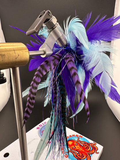 Purple and blue cobia jig with grizzly tail