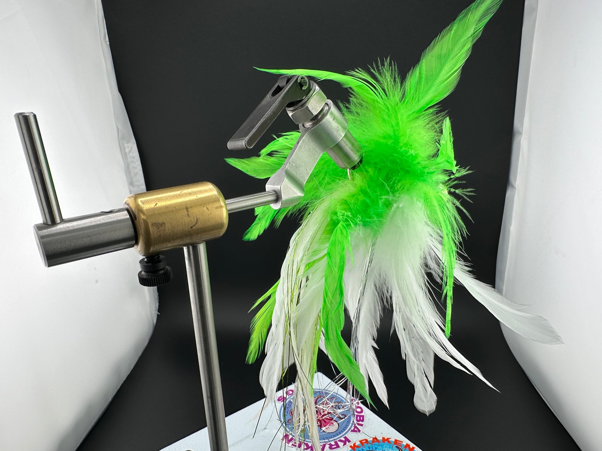 chartreuse and white bucktail feather jig for saltwater fishing
